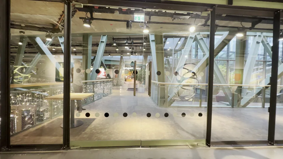 The gallery's glass front, looking out into the Bikini Berlin building